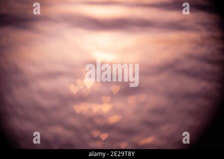 Abstract pink heart bokeh background Stock Photo