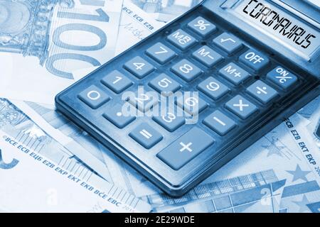 Euro banknotes, calculator and coronavirus Stock Photo