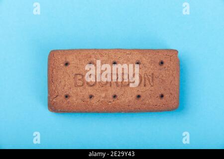 Bourbon biscuits isolated on a blue background Stock Photo
