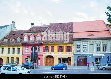 Beautiful colorful houses in Sighisoara in typical traditional style Stock Photo