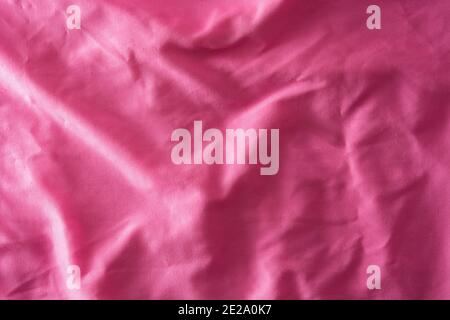 Pink wrinkled cloth background Stock Photo