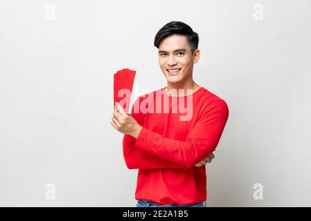 Lucky red envelope in Vietnamese Tet holiday for lucky, successful, make a  lot of money. High-quality stock images of red envelopes Lunar New Year  Stock Photo - Alamy