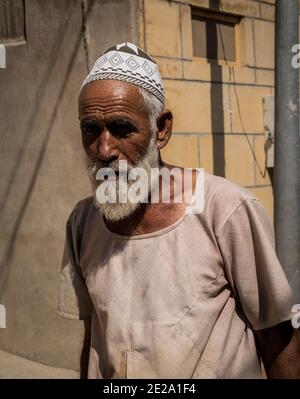 Jaisalmer, Rajasthan / India - November 15 2020 : old bearded muslim man wearing taqiyah