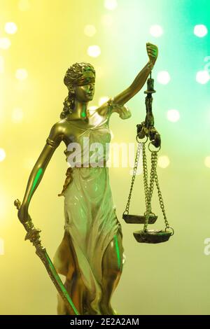 Legal office of lawyers and attorneys legal bronze model statue of Themis goddess of justice. This statue has no specific author. No need model releas Stock Photo