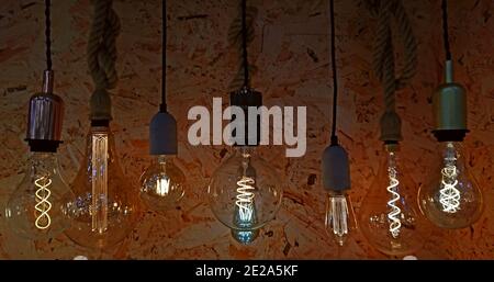 Several decorative bulbs with their filaments lit Stock Photo