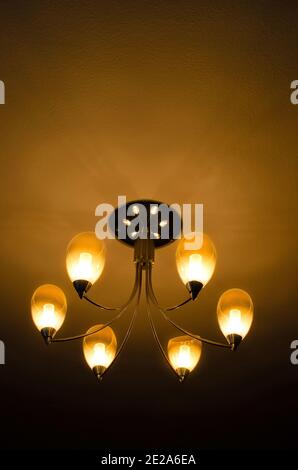 Decorative Lamp Shade with Candle Like Lights,  Low angle View,  Studio Shot Stock Photo