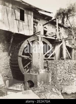 Vintage 19th century photograph: area of AIX-les-BAINS - Gorges du Sierroz - memorial stone to Baronne Baron de Broc, waterwheel, image c.1890's, France. Stock Photo