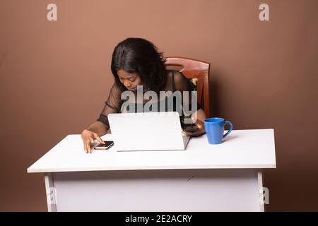 a young lady on social media Stock Photo