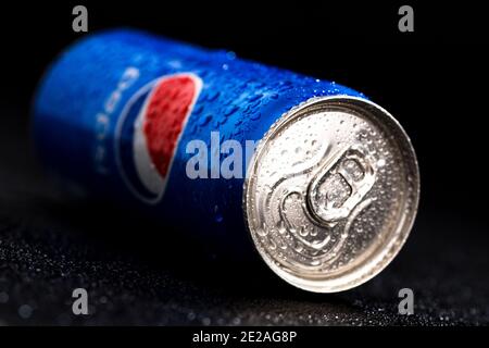 Editorial photo of Pepsi can with water droplets on black background. Studio shot in Bucharest, Romania, 2021 Stock Photo