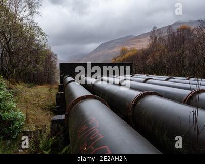 Pipework carrying water from Blackwater Dam to Kinlochleven hydroelectric power station, Scotland UK Stock Photo