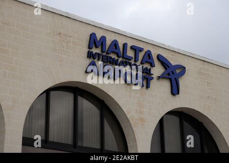 Gudja, Malta - October 19, 2020: Front view of the sign 'Malta International Airport' above the main entrance of the international airport of Malta Stock Photo
