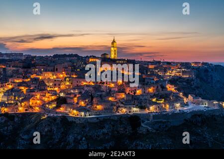 Scenic sunset over Sassi ancient district of Matera, Basilicata, southern Italy Stock Photo