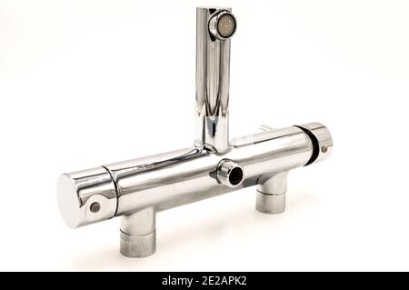 Water tap, chromed metal tap for the bathroom, kitchen mixer tap with hot cold water. plumbing. Isolated on white background Stock Photo