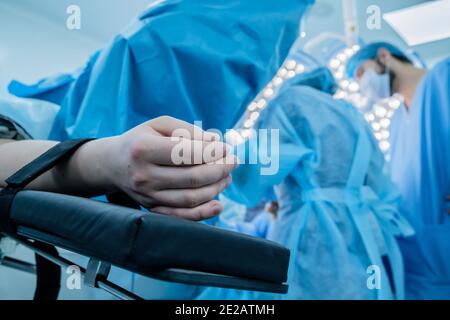 Iv Sleep Injection Surgery Hand with dropper needle and epidural anesthesia injection. Pregnant ...