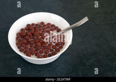 Chocolate cereal balls isolated on black background Stock Photo