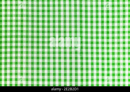 Green and white abstract checkered pattern background, picnic gingham tablecloth, square fabric texture. Stock Photo