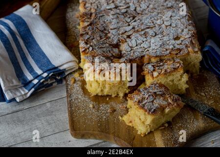 sheet cake on wooden board from above Stock Photo