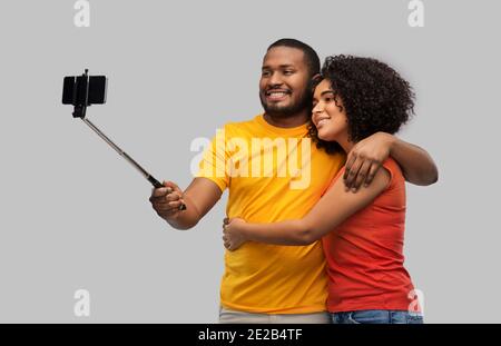african american couple taking selfie by cellphone Stock Photo