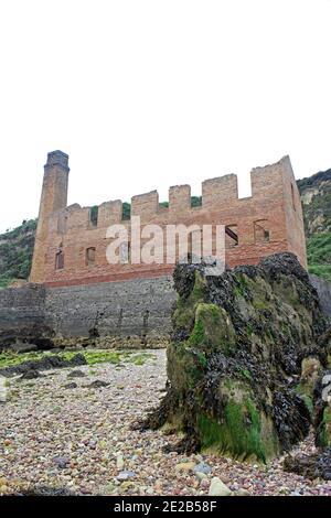 Porth Wen brickworks and beach Anglesey Stock Photo