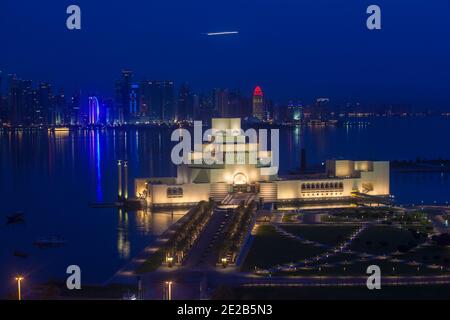 Qatar, Doha, Traffic at roundabout infont of the Museum of Islamic Art Stock Photo