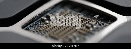 Back side of modern motherboard with computer processor mount Stock Photo