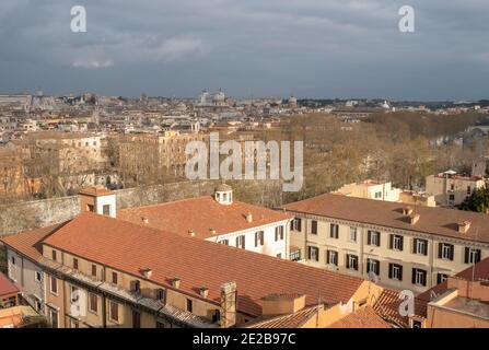 View across rooftops onto central Rome, Italy, from Trastevere across the River Tiber Stock Photo