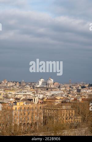View of central Rome from Trastevere across the River Tiber, towards the Vittorio Emanuele II Monument and the Church of Sant Andrea della Valle Stock Photo