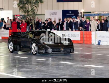 A  rare Bugatti EB110, being driven down the 'Grand Avenue' at the 2015 London Classic Car Show Stock Photo