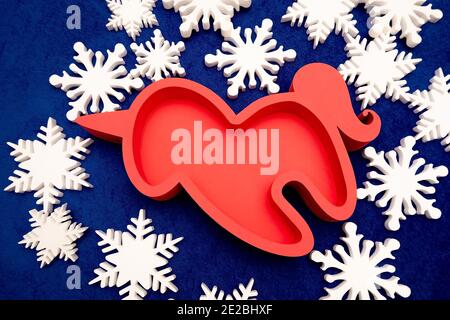 foam boxes made of pepoplast, extruded polystyrene foam for edible bouquets. pink unicorn. gift wrapping on a background of snowflakes Stock Photo
