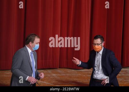 Bernburg, Germany. 12th Jan, 2021. Markus Bauer (l, SPD), incumbent District Administrator of the Salzlandkreis, and Alexander Goebel (r, CDU), talk in front of the stage of the Kurhaus. In the evening, the candidates for the upcoming district administrator election were presented to the public there. The election of the district administrator scheduled for 24 January 2021 can take place. Credit: Klaus-Dietmar Gabbert/dpa-Zentralbild/dpa/Alamy Live News Stock Photo