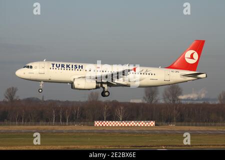Turkish Airlines Airbus A320-200 with registration TC-JPG on short final for runway 23L of Dusseldorf Airport. Stock Photo