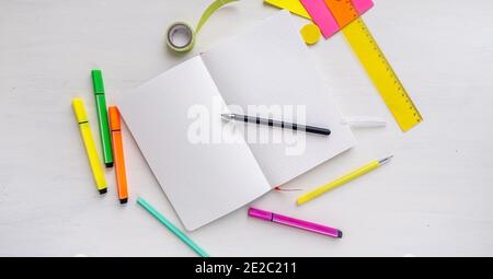 Open blank bullet journal planner with dotted pages with a pen. Concept for New Years Resolutions, planning and organization Stock Photo