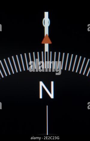 Close up detail of a digital compass pointing North on an APP on the screen of a Smartphone Stock Photo