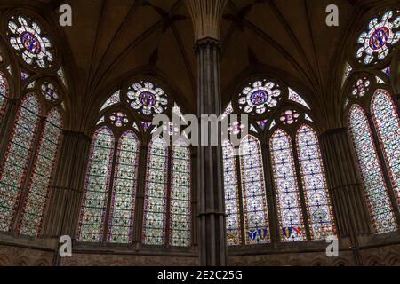 The stained glass window inside the 13th century Chapter House, Salisbury Cathedral, Salisbury, Wiltshire, UK. Stock Photo