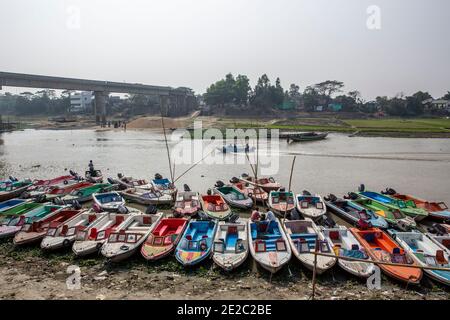 Old plastic fishing boats on the bank of the lake in summer sunny day Stock  Photo - Alamy