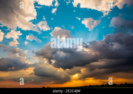 Dramatic sky during sunset, just before a summer storm. Photo taken in 13th of June 2020, nearby Timisoara city, Romania. Stock Photo