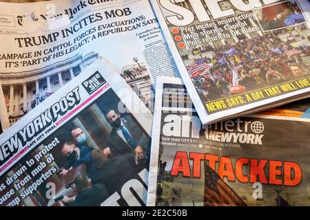 Front pages and headlines of the New York newspapers on Thursday, January 7, 2021 report on the previous days’ attack on the US. Capitol by Trump supporters interrupting the electoral vote certification.. (© Richard B. Levine) Stock Photo