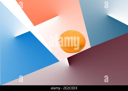 Orange in the center of the space surrounded by polygons Stock Photo