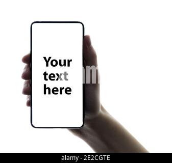 Mobile phone in the hand of a teenager, mocap copy space Stock Photo