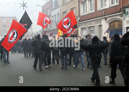 Some of the 600 French and Belgium far-right demonstrators shout slogans as they take part in a protest in Lille, northern France on October 8, 2011. Photo by Sylvain Lefevre/ABACAPRESS.COM Stock Photo