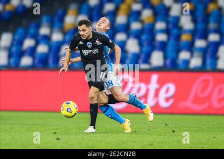 Empoli's Swiss midfielder Nedim Bajrami challenges for the ball with SSC Napoli's Slovak midfielder Stanislav Lobotka during the italy cup football match SSC Napoli vs Empoli. Stock Photo