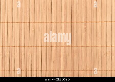 Full frame close-up shot of a bamboo food mat. Traditional kitchen utensils. Stock Photo