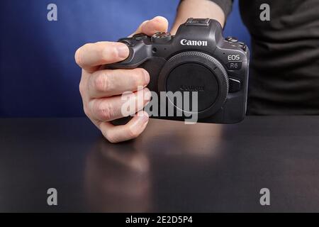 St. Petersburg, Russia - January 9, 2021: Full frame mirrorless Camera EOS R6 brand of Canon. Stock Photo