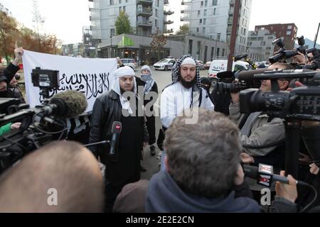 Members of radical Muslim group Forsane Alizza (Knights of Pride) and their leader Abou Hamza demonstrate outside the Court of Justice in support of Lies Hebbadj, in Nantes, France on November 21, 2011. The prosecutor has required Hebbadj and his two mistresses Sandrine Mouleres and Sonia Yaker to be sued for social aid fraud. Photo by Laetitia Notarianni/ABACAPRESS.COM Stock Photo