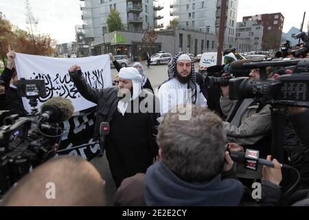 Members of radical Muslim group Forsane Alizza (Knights of Pride) and their leader Abou Hamza demonstrate outside the Court of Justice in support of Lies Hebbadj, in Nantes, France on November 21, 2011. The prosecutor has required Hebbadj and his two mistresses Sandrine Mouleres and Sonia Yaker to be sued for social aid fraud. Photo by Laetitia Notarianni/ABACAPRESS.COM Stock Photo