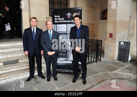 Paris Judiciary Police Director Christian Flaesch, Paris prefect Michel Gaudin and French actor and singer Patrick Bruel are pictured during a ceremony awarding the 65th Quai des Orfevres literary Price at police headquarters in Paris, France on November 22, 2011. Created in 1946, Quai des Orfevres literary Price rewards an unseen detective story, presented by a French language writter and choosen anonymously by a jury. This year the price was received by Pierre Borromee for 'L'Hermite etait pourpre'. Photo by Mousse/ABACAPRESS.COM Stock Photo