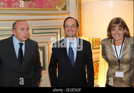 (L-R) Lyon Senator Mayor Gerard Collomb, Socialist presidential candidate Francois Hollande and former Areva CEO Anne Lauvergeon talk during the 'Forum Libe' hosted by French daily Liberation, in Lyon, France on November 25, 2011. Photos by Vincent Dargent/ABACAPRESS.COM Stock Photo