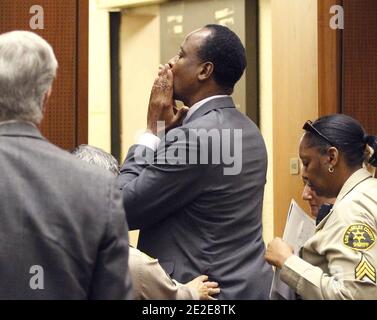 Dr. Conrad Murray blows a kiss to an unidentified member of the courtroom audience after he was sentenced to four years in county jail for his involuntary manslaughter conviction of pop star Michael Jackson in Los Angeles, CA, USA, on November 29, 2011. Photo by Mario Anzuoni/Pool/ABACAPRESS.COM Stock Photo