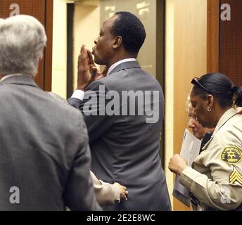 Dr. Conrad Murray blows a kiss to an unidentified member of the courtroom audience after he was sentenced to four years in county jail for his involuntary manslaughter conviction of pop star Michael Jackson in Los Angeles, CA, USA, on November 29, 2011. Photo by Mario Anzuoni/Pool/ABACAPRESS.COM Stock Photo