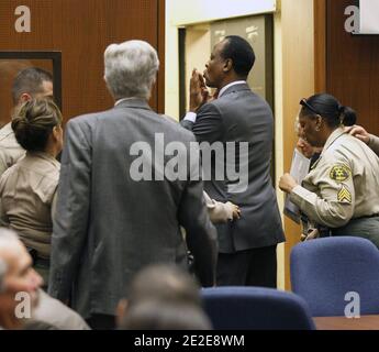 Dr. Conrad Murray blows a kiss to an unidentified member of the courtroom audience after he was sentenced to four years in county jail for his involuntary manslaughter conviction of pop star Michael Jackson in Los Angeles, CA, USA, on November 29, 2011. Photo by Mario Anzuoni/Pool/ABACAPRESS.COM Stock Photo